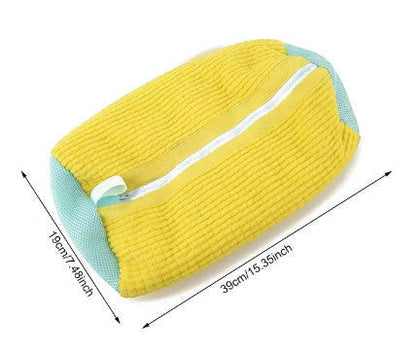Yellow and blue padded shoe wash bag protecting sneakers in the washing machine